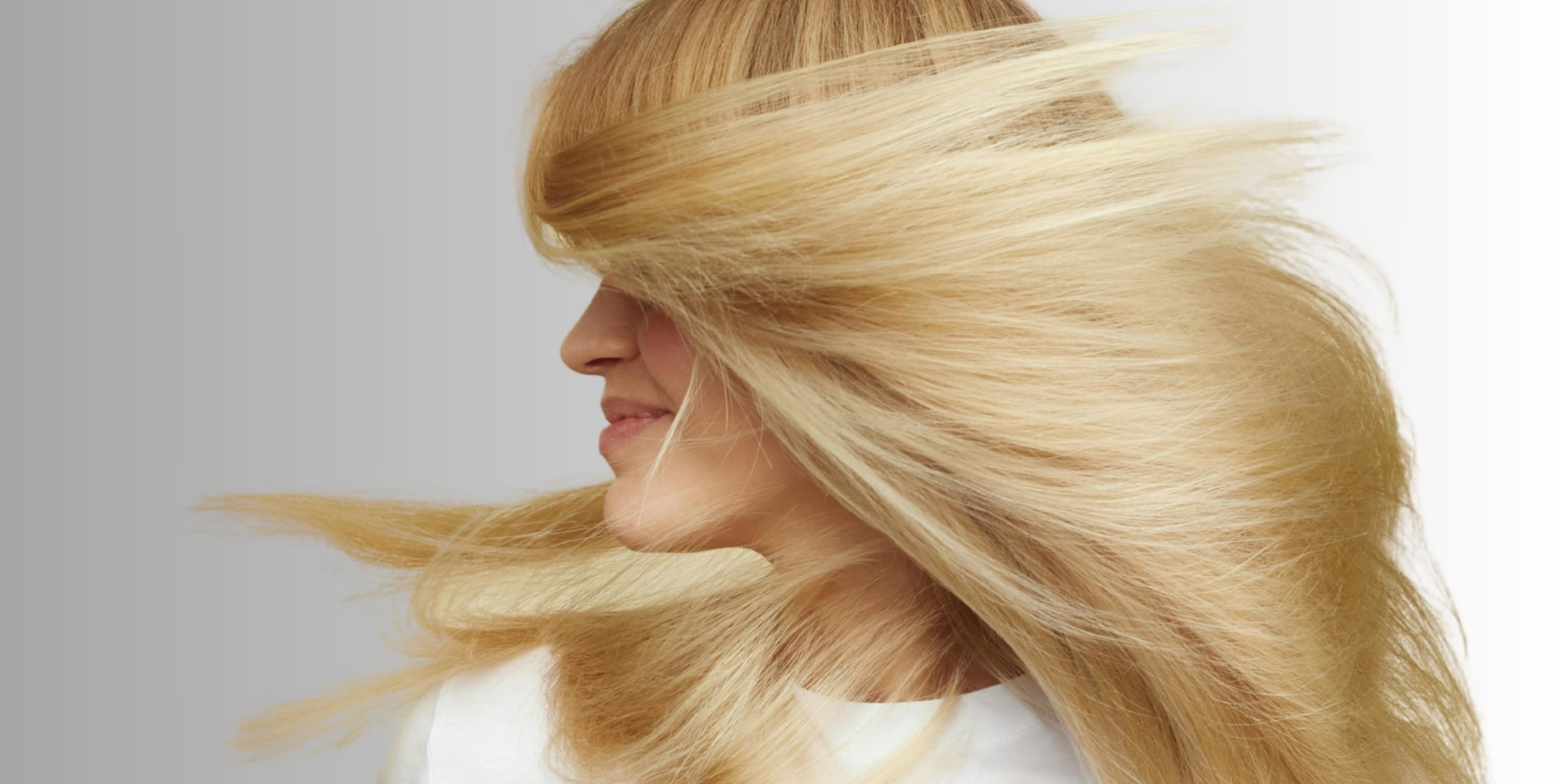 Mature woman with long, healthy, shiny hair